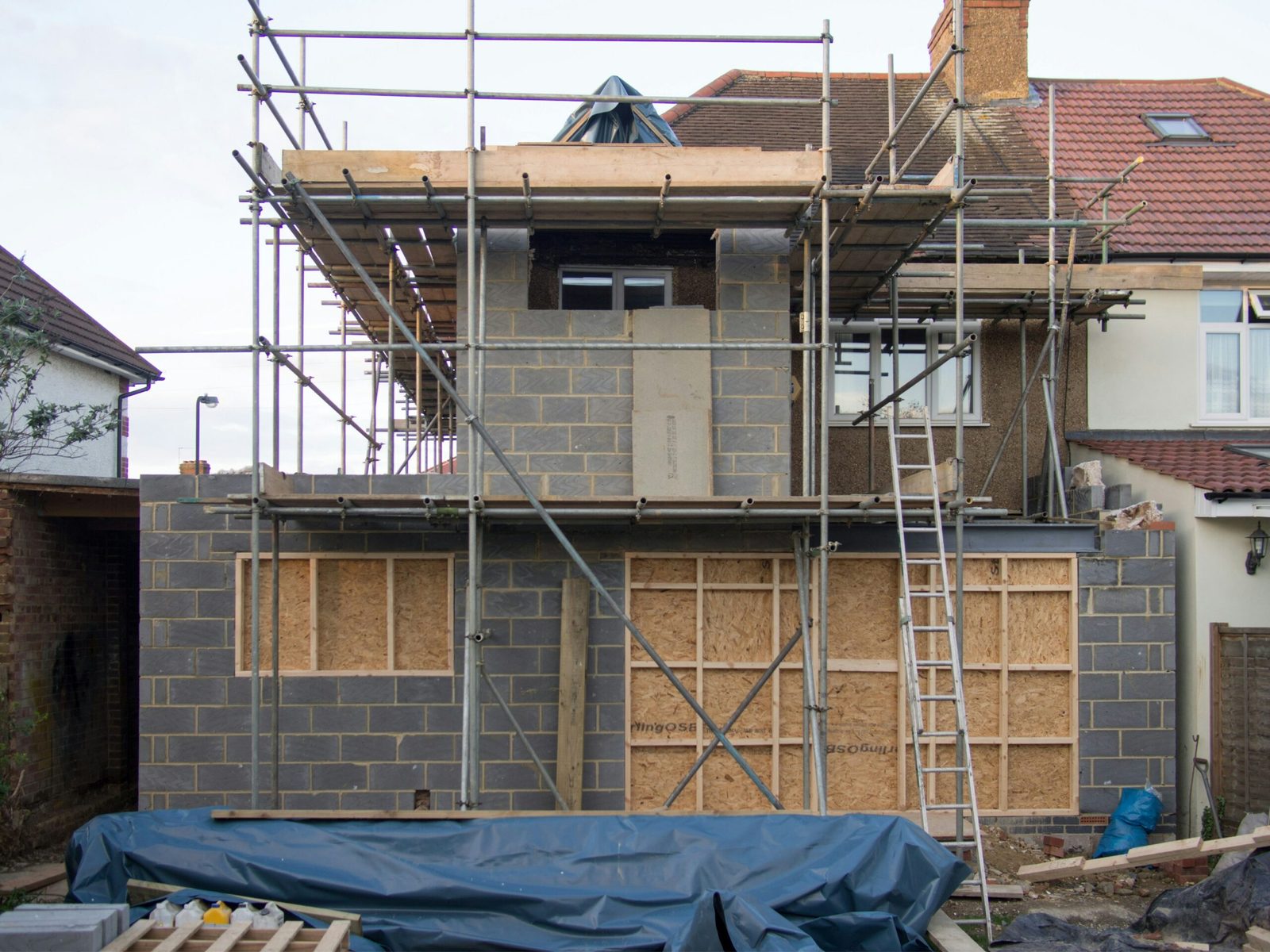 Scaffolding around a British home during building work