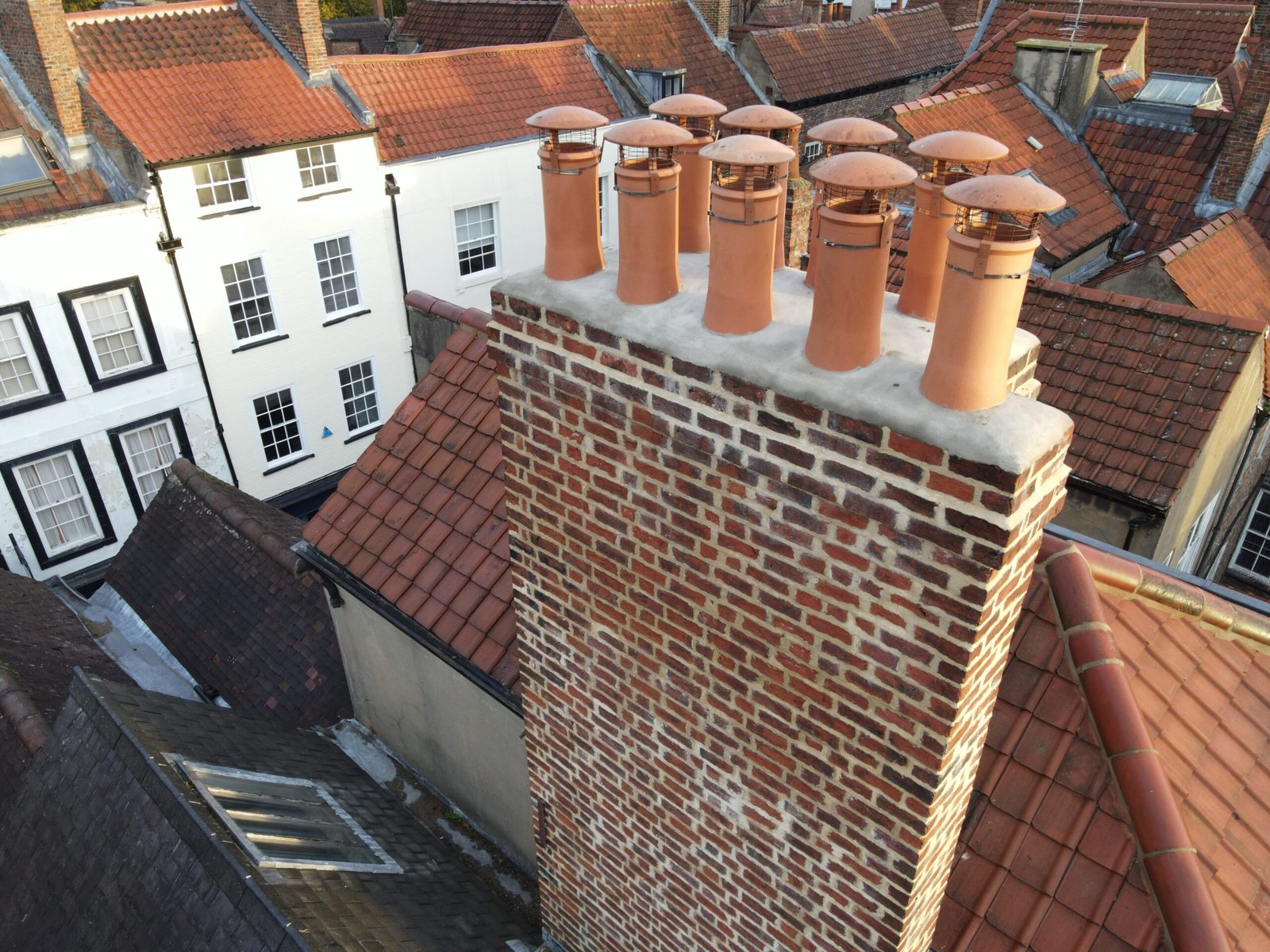 Chimney pots on a UK terraced house roof