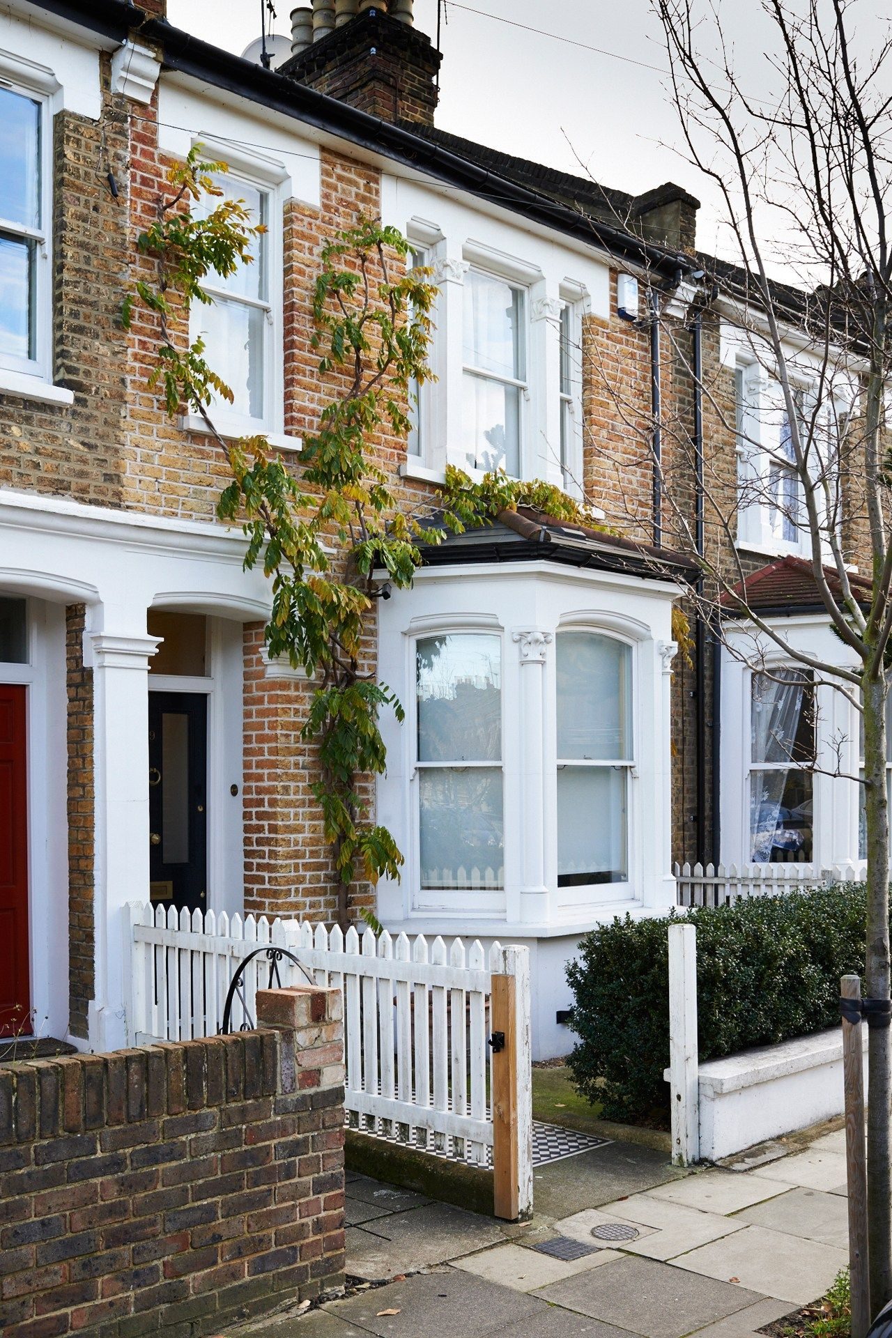 Victorian UK terraced houses with brick chimney stacks