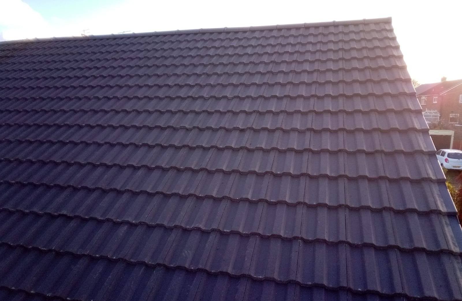 Close up of a brand new tiled roof covering on a UK property